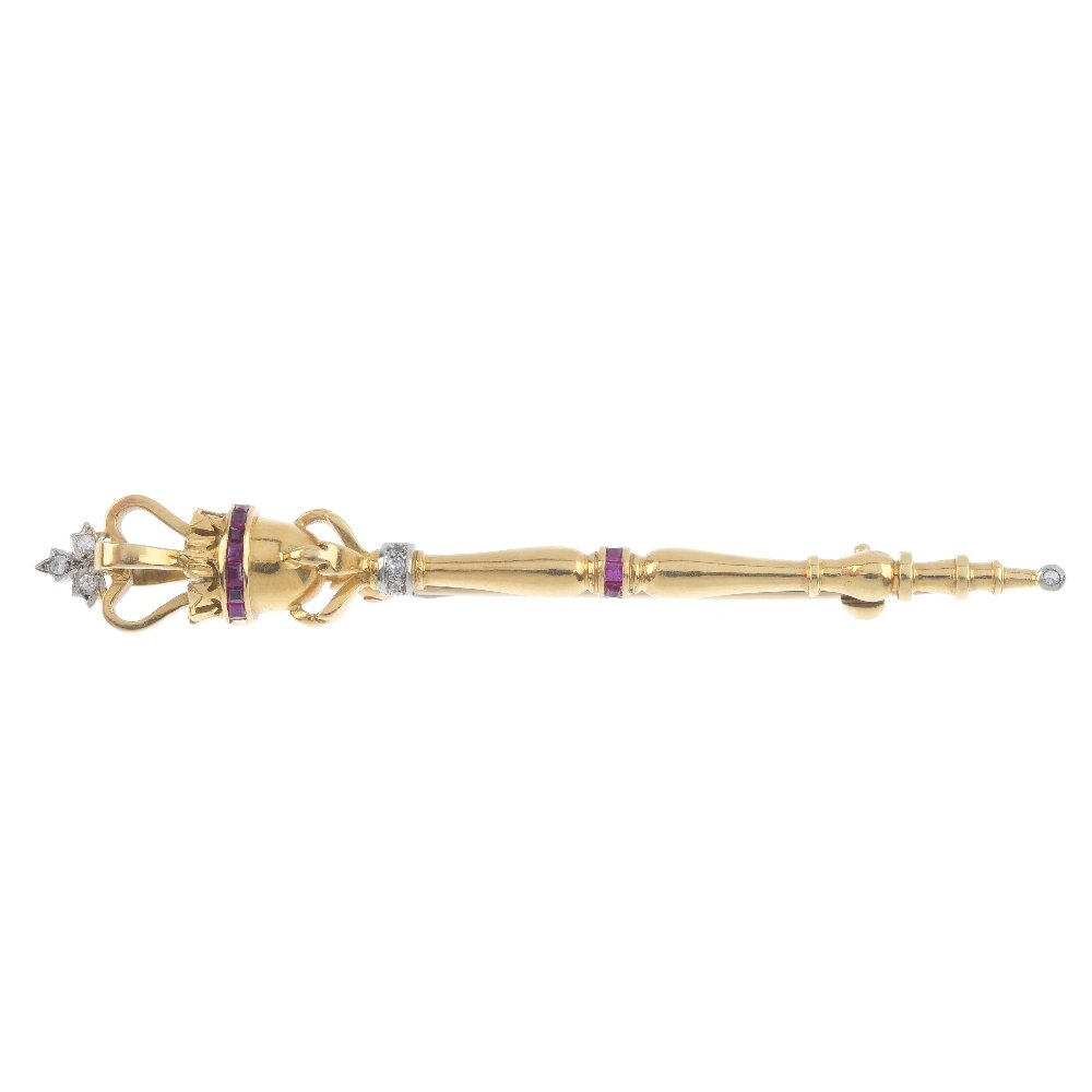 A diamond and ruby sceptre brooch. The tapered shaft, (1 of 2)