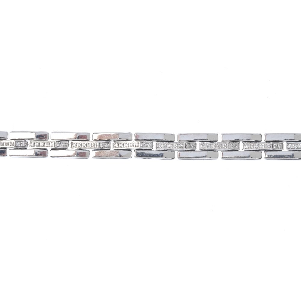 CHIMENTO - a 'Double Classic' diamond bracelet.: CHIMENTO - a 'Double Classic' diamond bracelet. Designed as a fancy-link chain, with brilliant-cut diamond line accents and push-piece clasp. Estimated total diamond weight 0.85ct. Italian marks. Sign