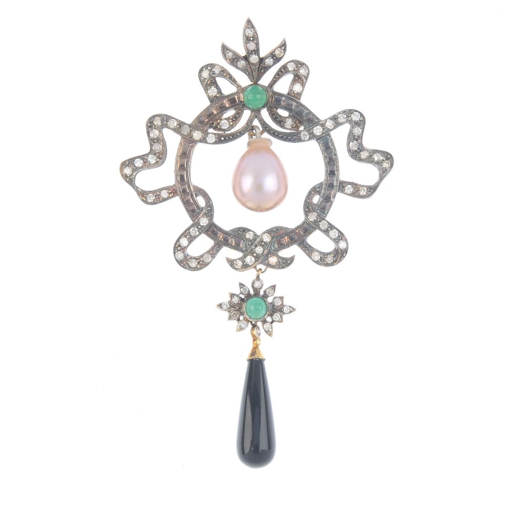 A freshwater cultured pearl, emerald and diamond (1 of 2)