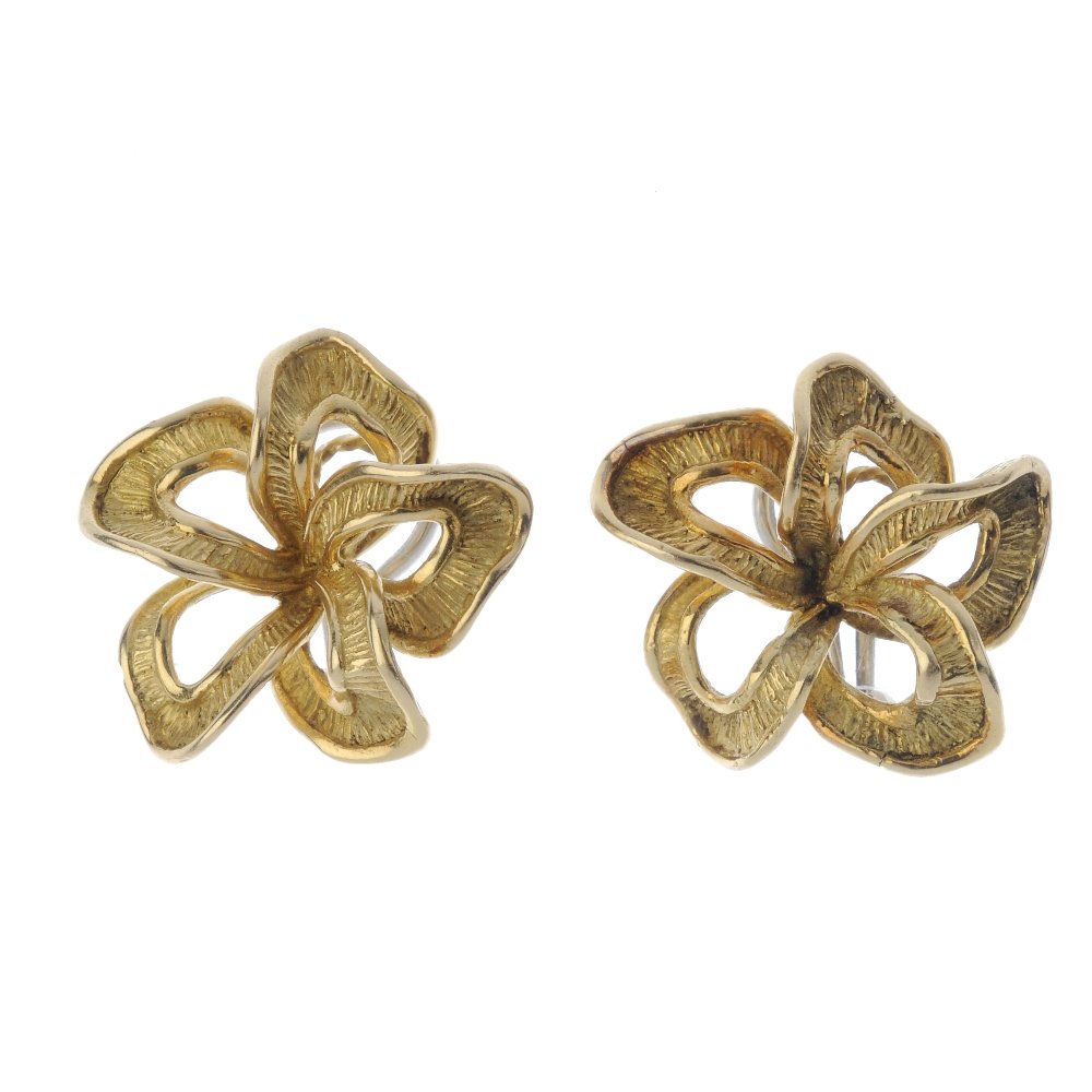 A pair of 1970s 18ct gold earrings. Each designed as an (1 of 2)