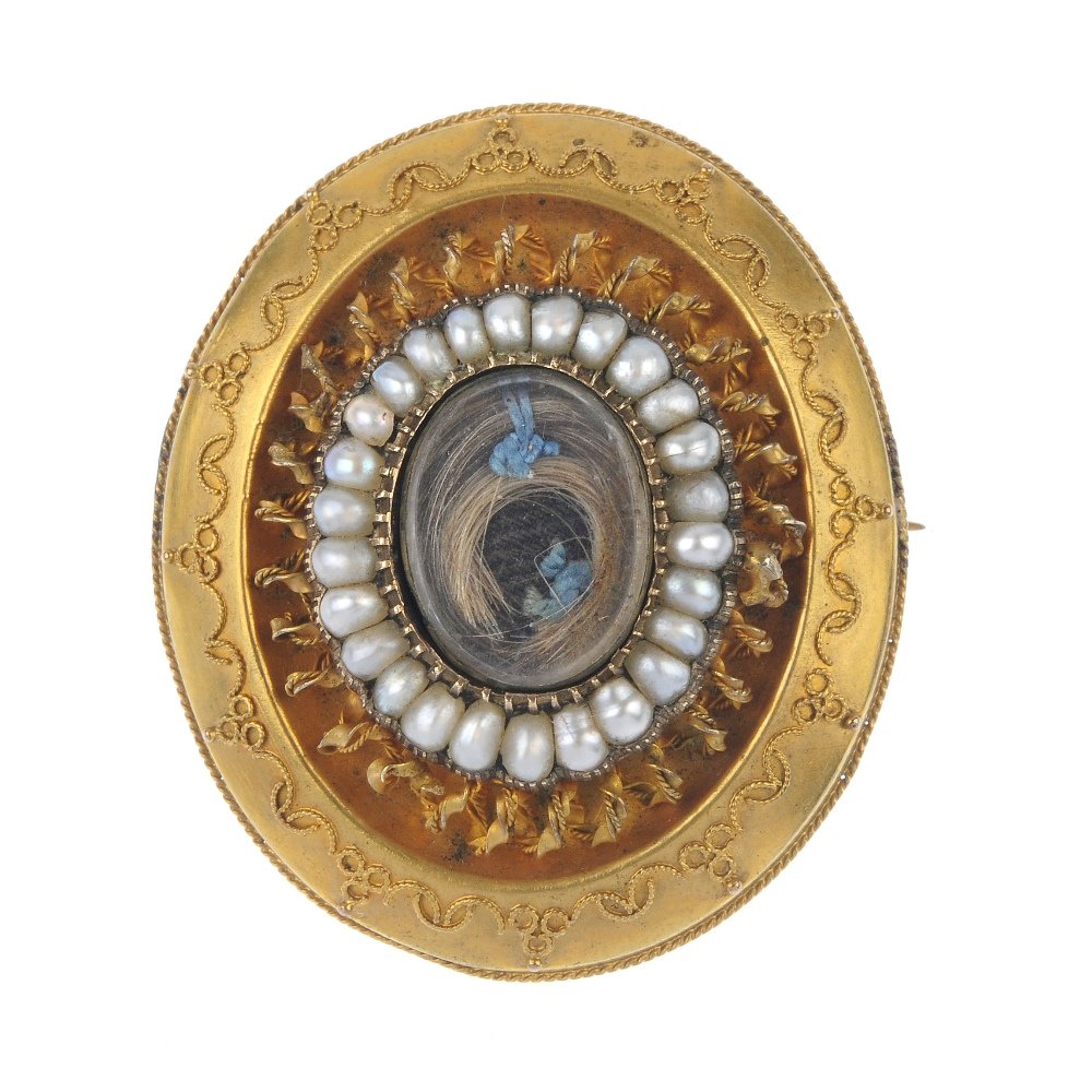 A mid Victorian gold pearl mourning brooch, circa 1860. (1 of 2)
