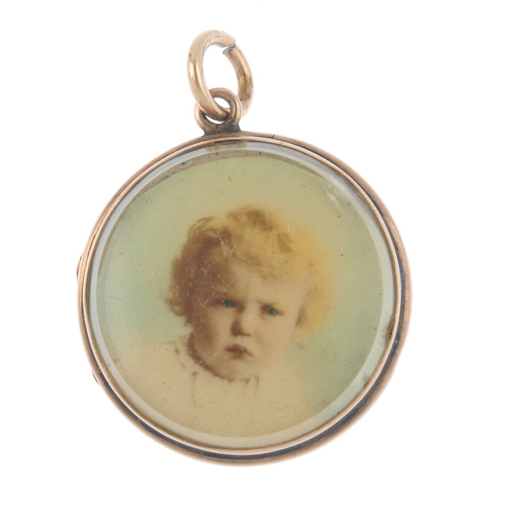 An early 20th century 9ct gold photograph locket. Of (1 of 3)