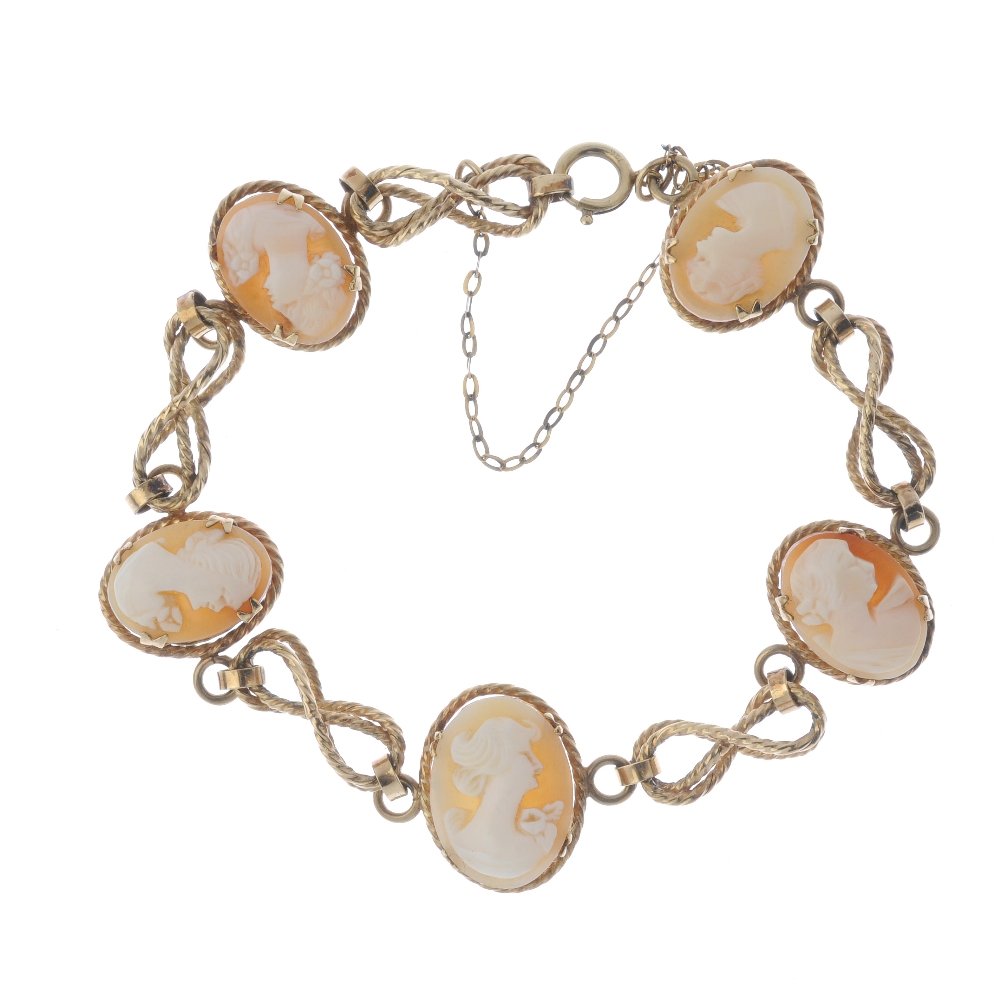 A 9ct gold cameo bracelet. Designed as five oval-shape (1 of 2)