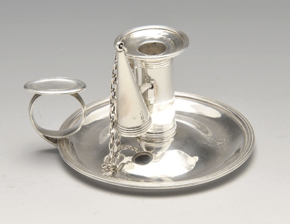 A George III small silver chamberstick, the crested (1 of 4)
