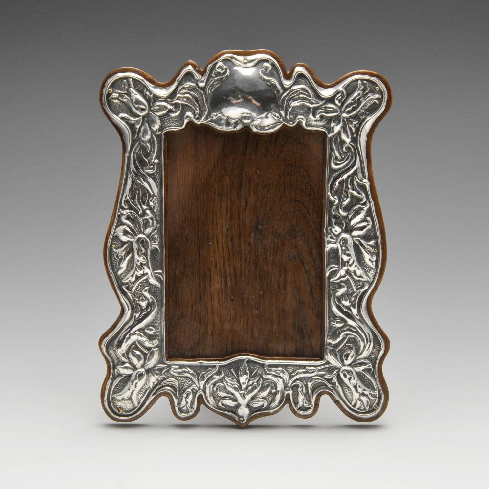 An Art Nouveau silver mounted photograph frame, the (1 of 5)