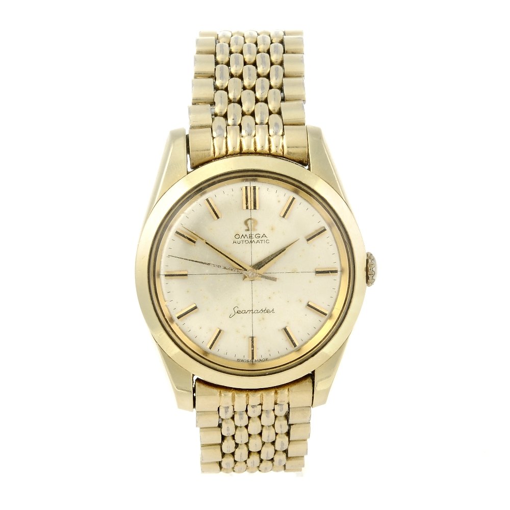 OMEGA - a gentleman's Seamaster bracelet watch. Gold (1 of 4)
