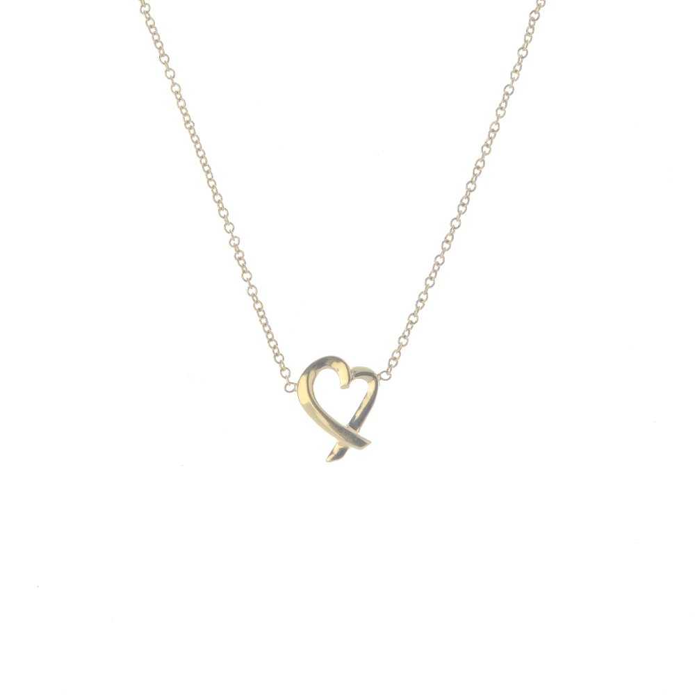 TIFFANY & CO. - a 'Loving Heart' pendant, by Paloma: TIFFANY & CO. - a 'Loving Heart' pendant, by Paloma Picasso for Tiffany & Co. The stylised heart, with integral trace-link chain. Signed T & Co., Paloma Picasso. Length of pendant 1cms. Length of chai