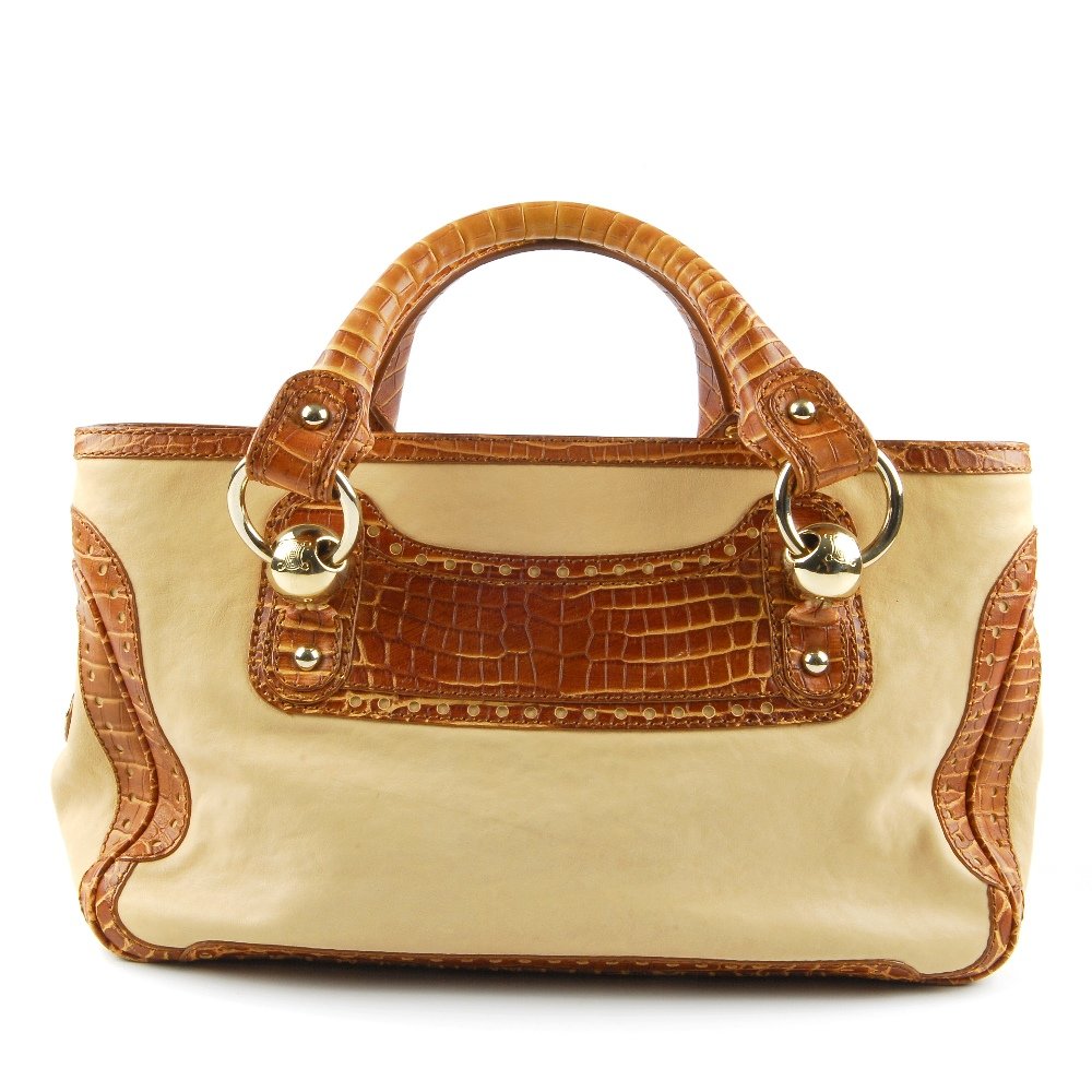 CELINE - a Boogie handbag. Crafted from beige leather (1 of 6)