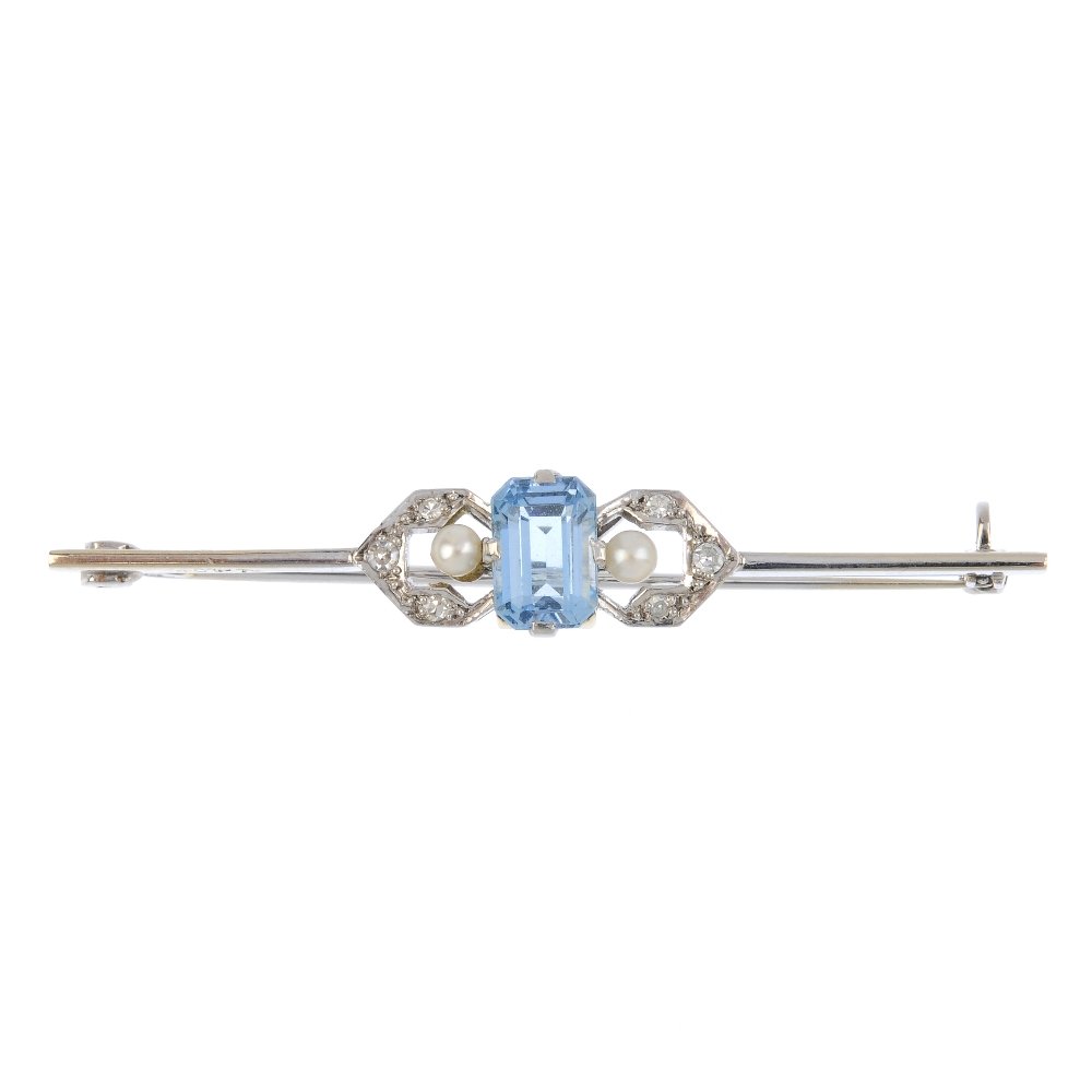 An aquamarine and diamond bar brooch. The (1 of 2)