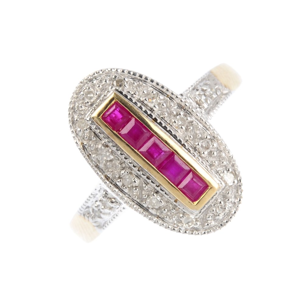 A 9ct gold ruby and diamond dress ring. The (1 of 3)