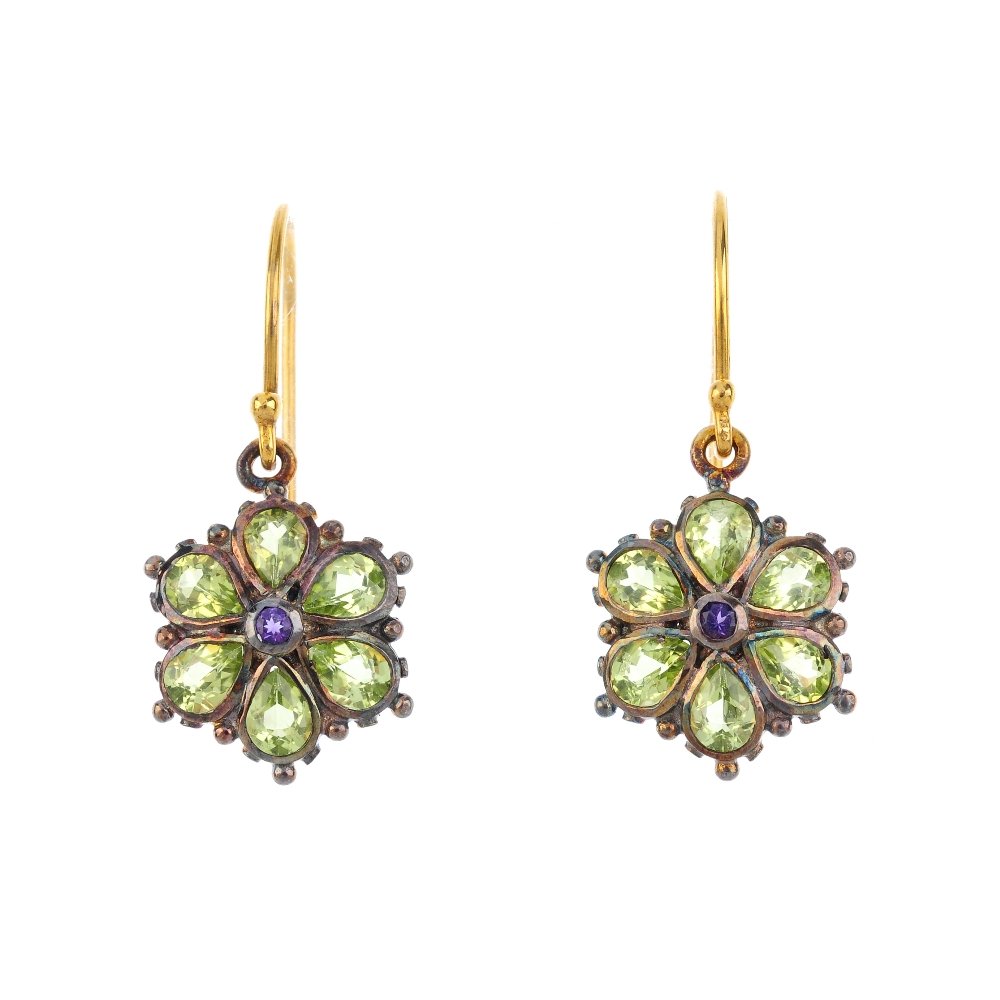 A pair of gem-set cluster earrings. Each designed as a (1 of 2)