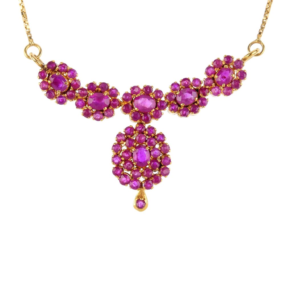 (1000970-2-A) A ruby cluster pendent necklace. Designed (1 of 4)