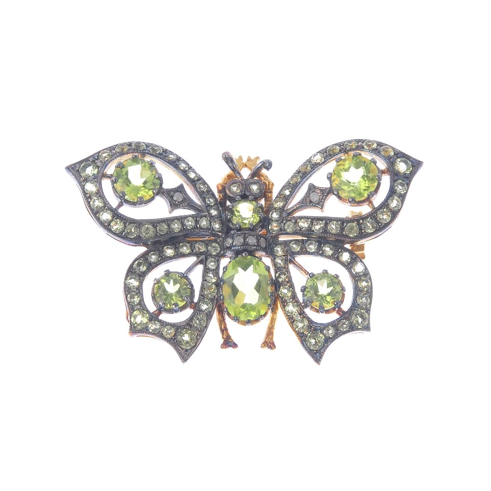 A gem-set butterfly brooch. The oval and circular-shape (1 of 2)