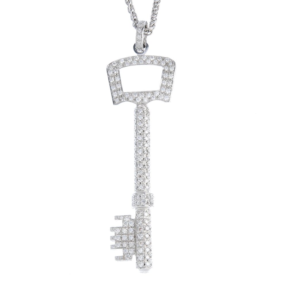 An 18ct gold diamond pendant. Designed as a pave-set (1 of 3)
