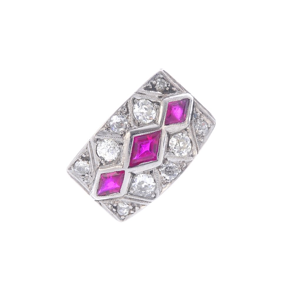 A synthetic ruby and diamond dress ring. The graduated (1 of 4)