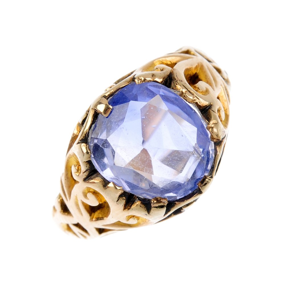 A Ceylon sapphire single-stone ring. The oval-shape Sri (1 of 1)