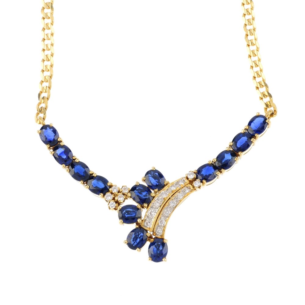 A sapphire and diamond necklace. Of stylised floral (1 of 3)