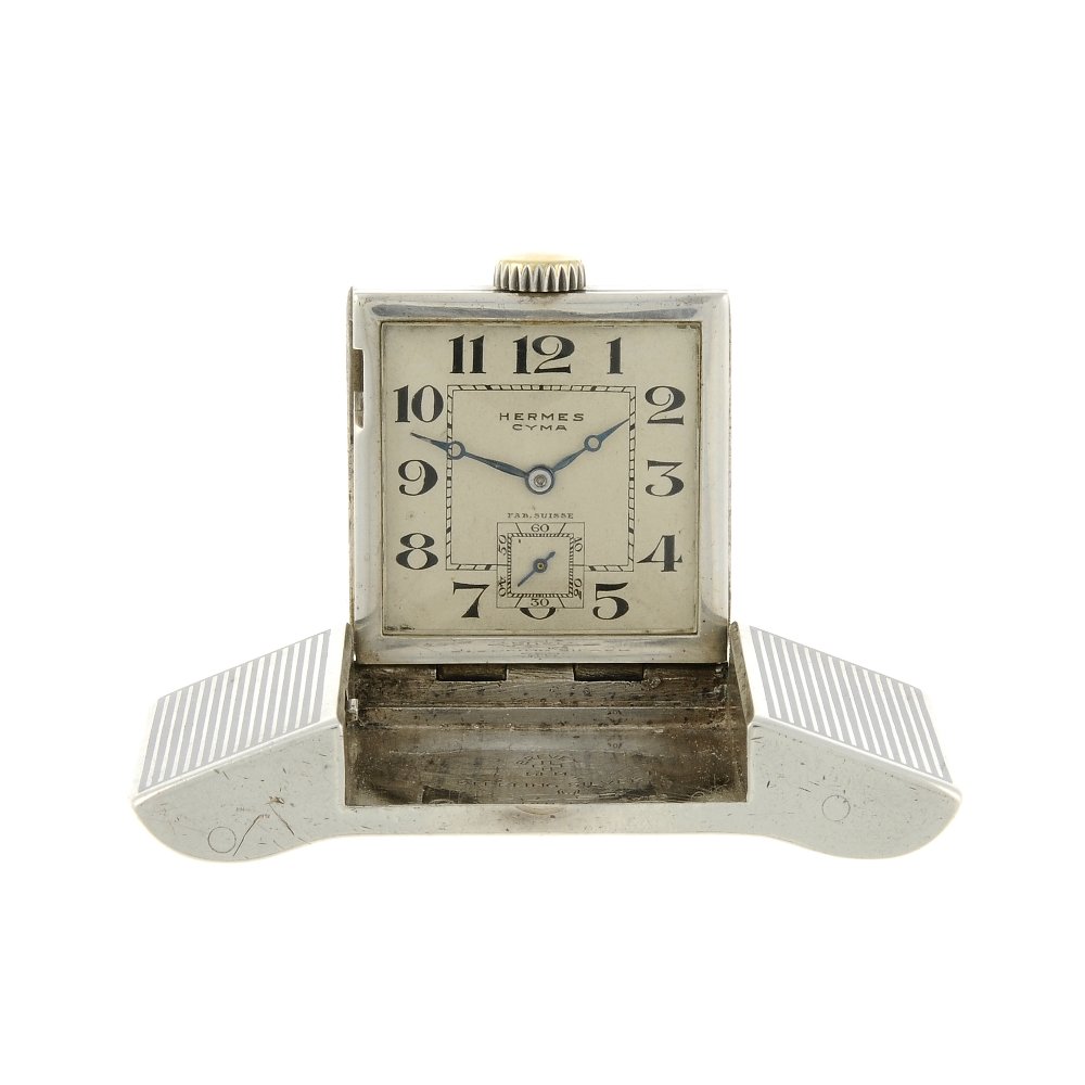 A belt buckle watch by Herms. Continental white metal (1 of 4)