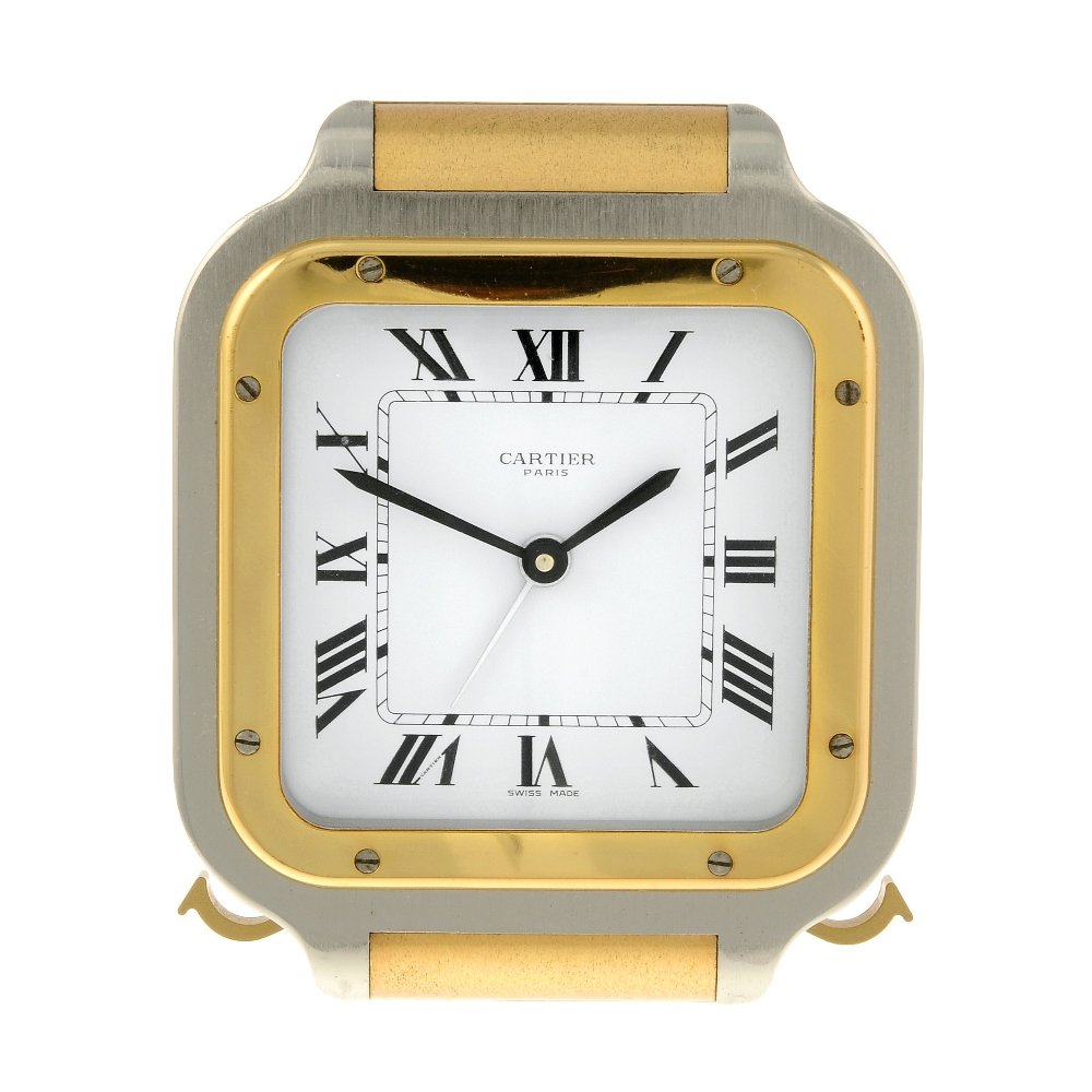 A Santos alarm clock by Cartier. Bi-colour case. (1 of 2)