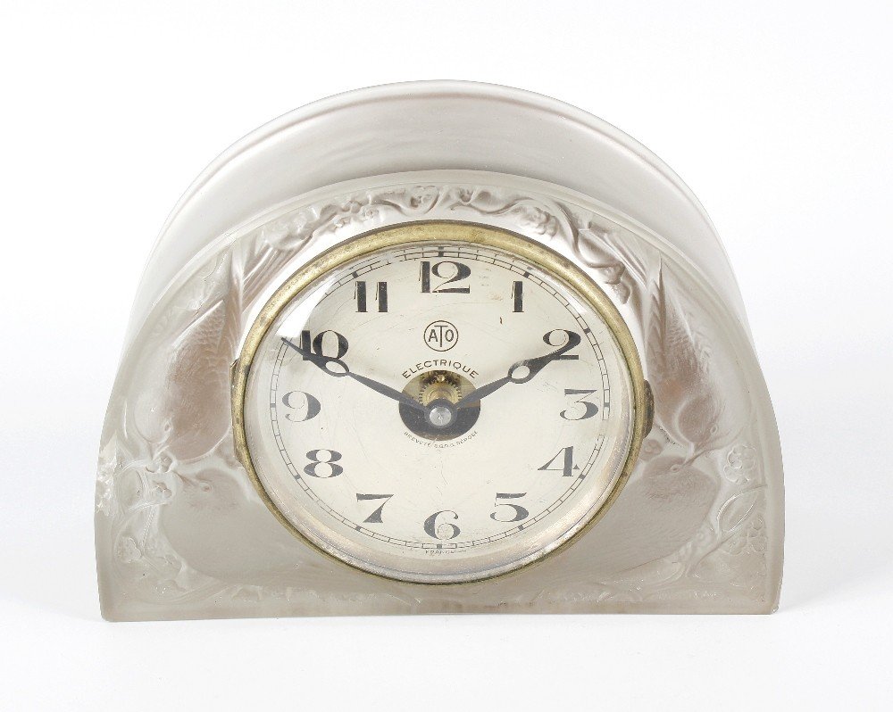 A rare Rene Lalique 'Moineaux' pattern glass mantel: A rare Rene Lalique 'Moineaux' pattern glass mantel clock, of semicircular section, decorated with two pairs of birds, flanking original 4.5-inch Arabic dial marked ATO ELECTRIQUE BREVETE S.G.D.G.DEPO