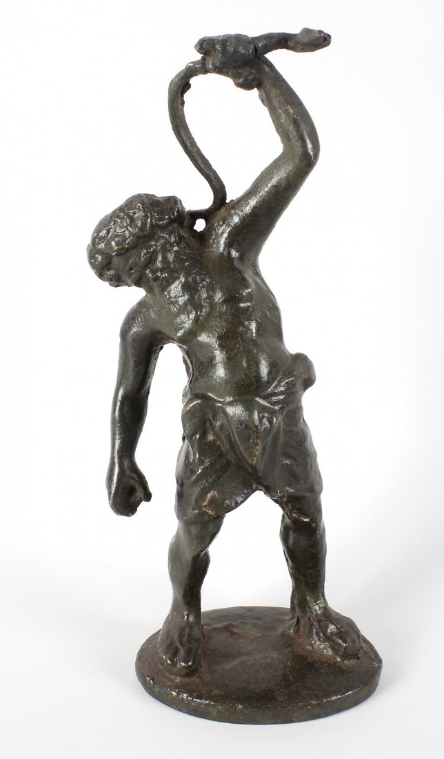 A 19th century Grand Tour bronze figure modelled as: A 19th century Grand Tour bronze figure modelled as Silenus, holding aloft a serpent, upon an oval base of naturalistic form, 10.25 (26cm) high. Serpent has been broken and repaired
