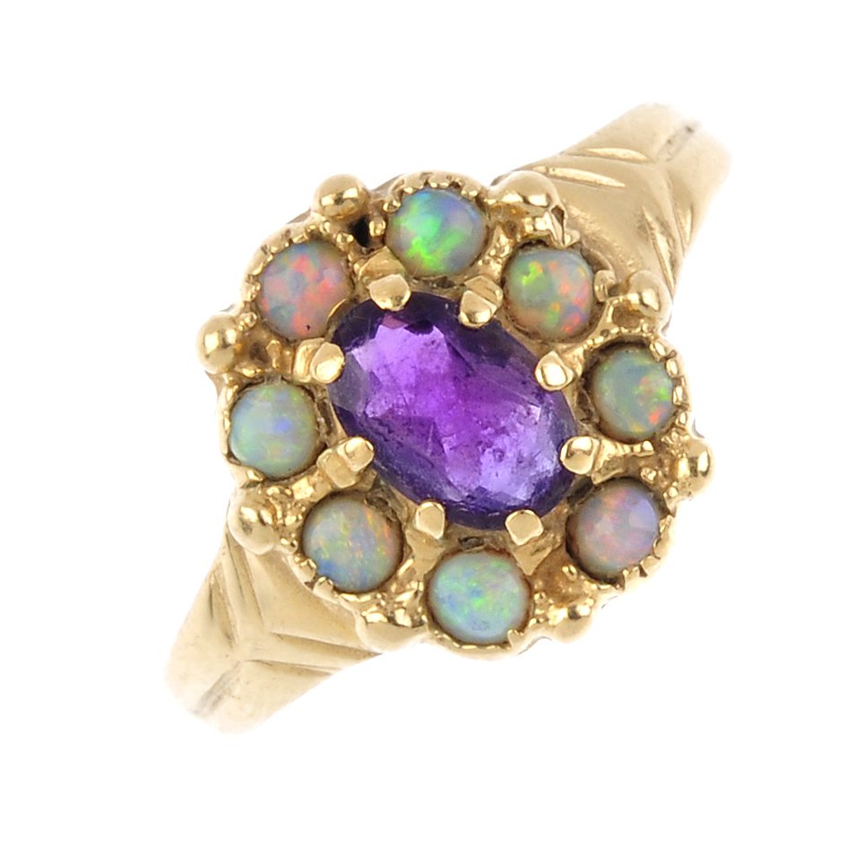 Four 9ct gold gem-set rings. To include a ruby panel (1 of 3)