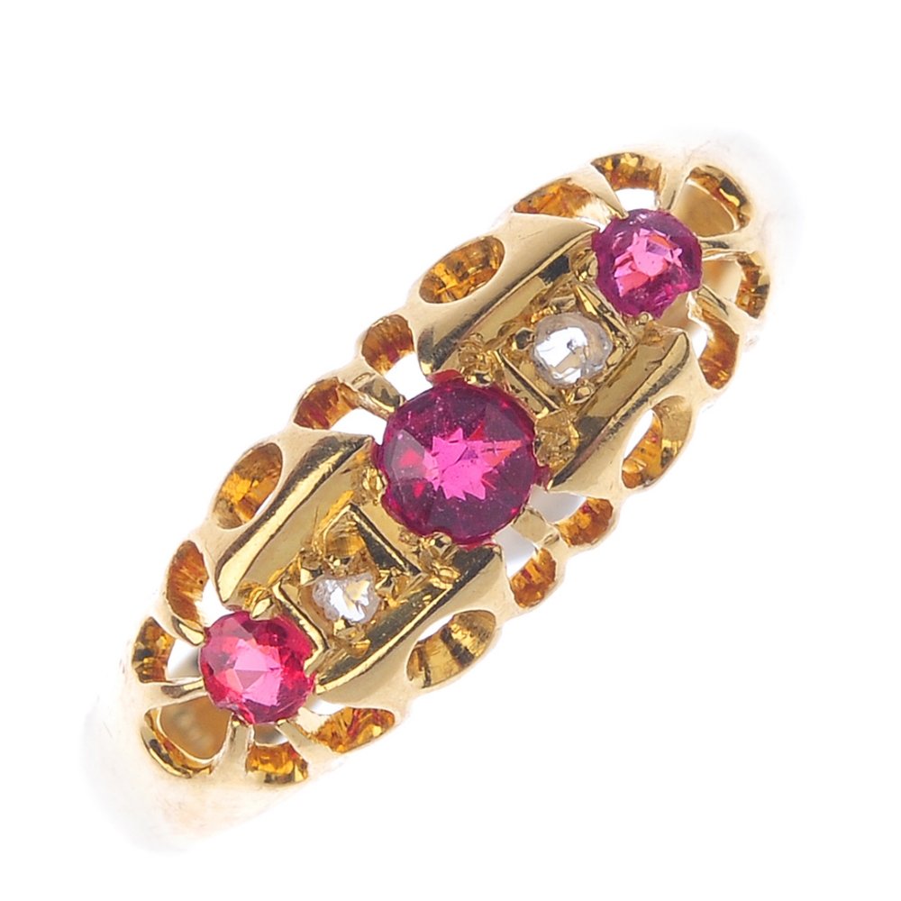 A 1920s 18ct gold ruby and diamond dress ring. The (1 of 3)