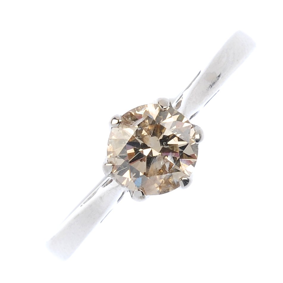 An 18ct gold diamond single-stone ring. The (1 of 3)