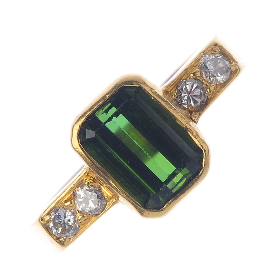 An 18ct gold tourmaline and diamond dress ring. The (1 of 3)