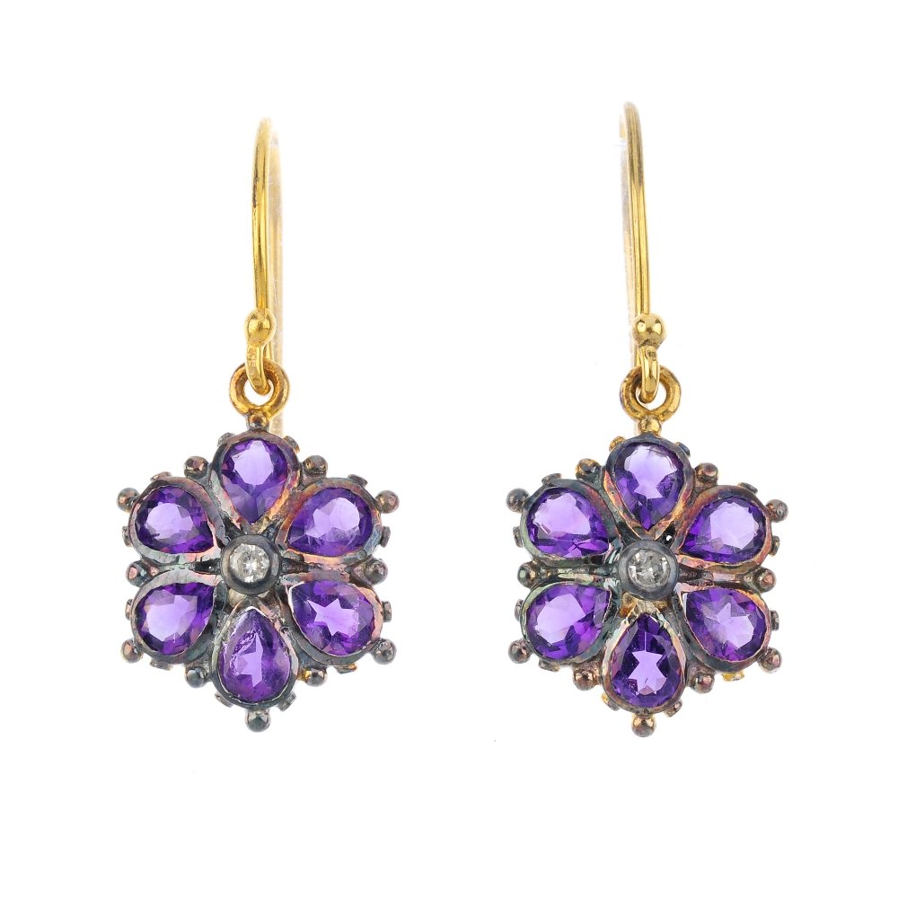 A pair of amethyst and diamond floral earrings. Each (1 of 2)