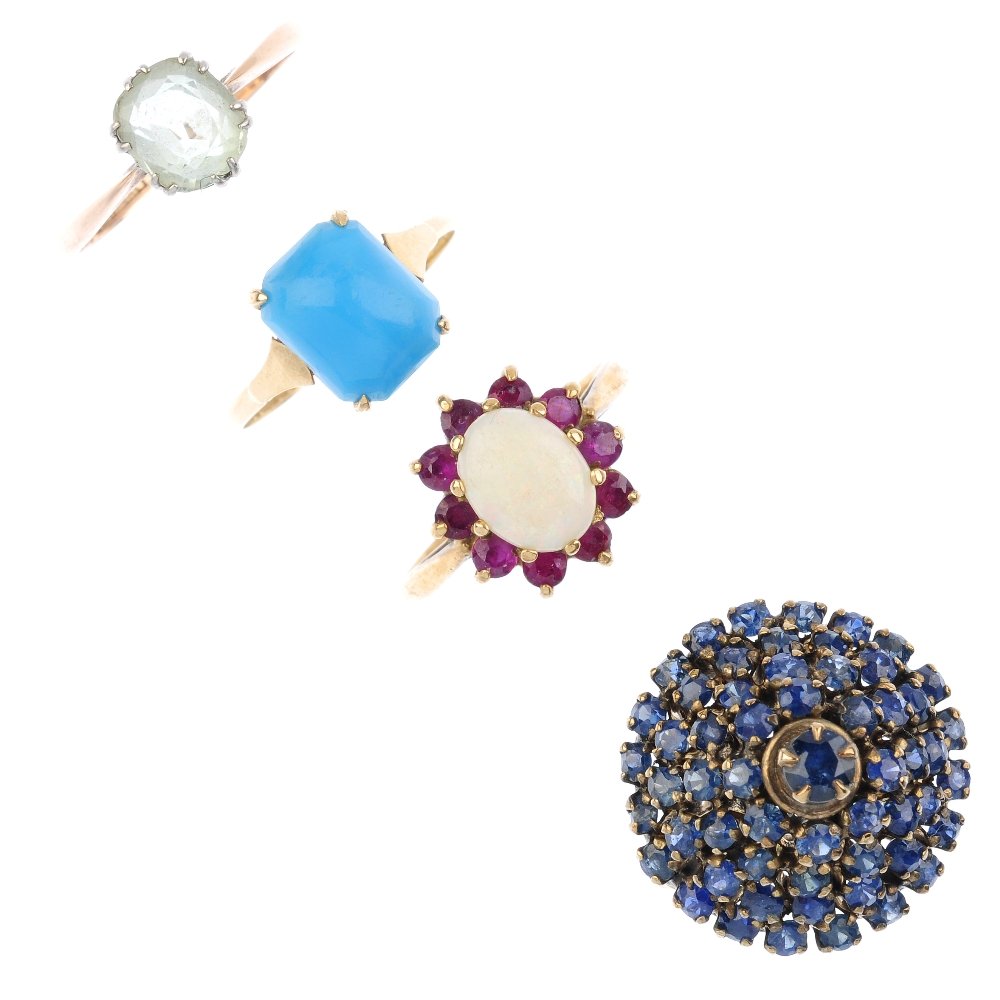 Four gem-set dress rings. A 9ct gold opal and ruby (1 of 2)