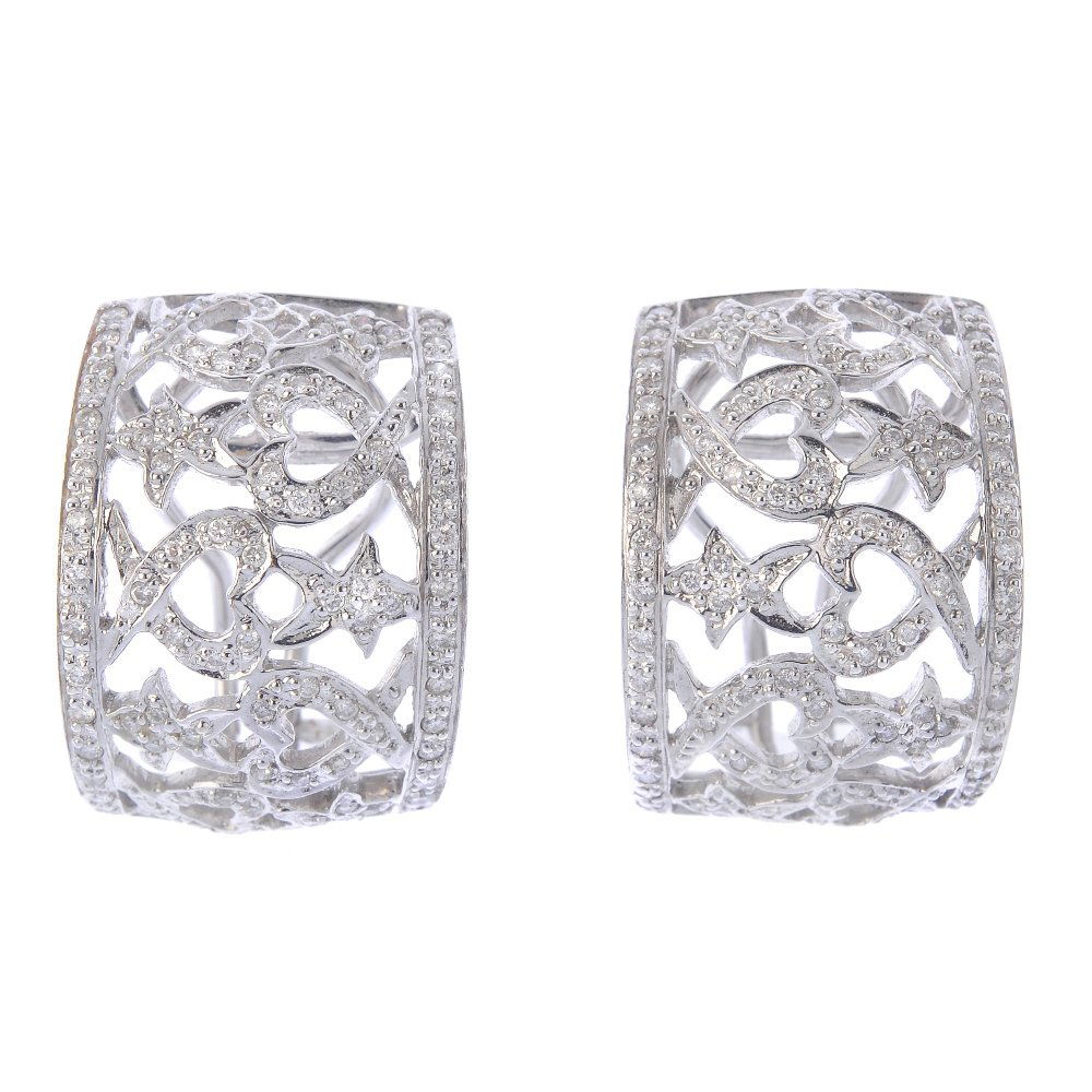 (203799) A pair of diamond earrings. Each designed as a (1 of 3)
