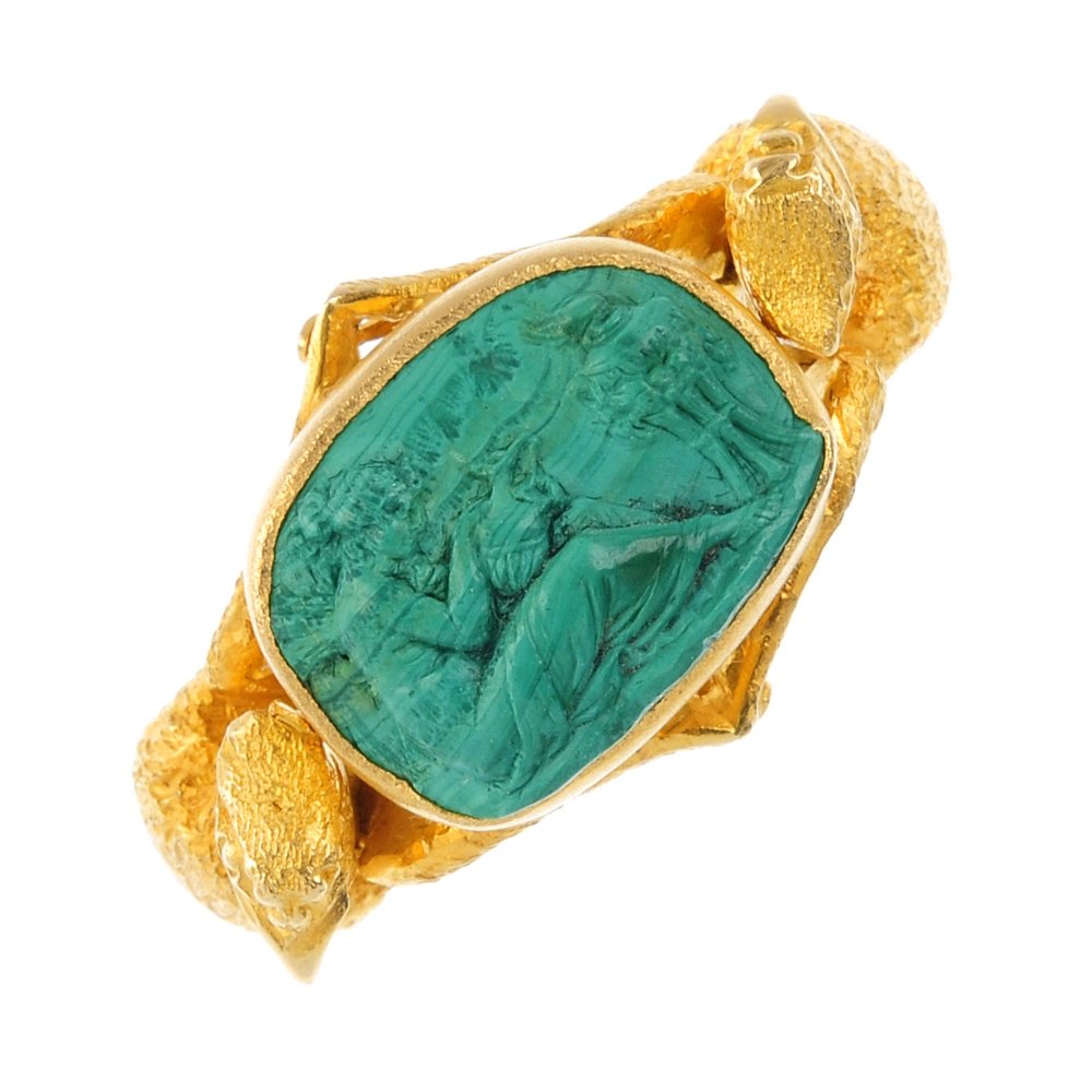 A late 19th century 18ct gold carved malachite ring. (1 of 3)