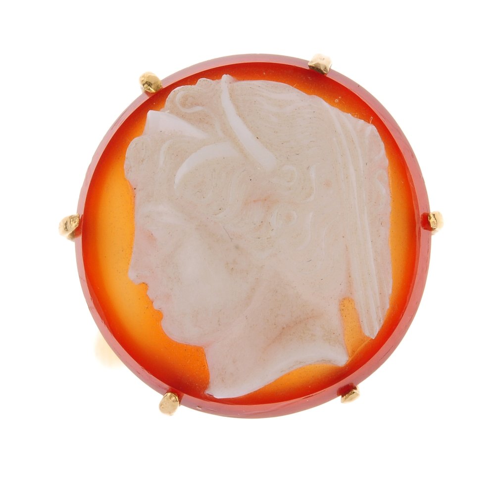 A 15ct gold cameo ring. The carnelian cameo of circular (1 of 3)