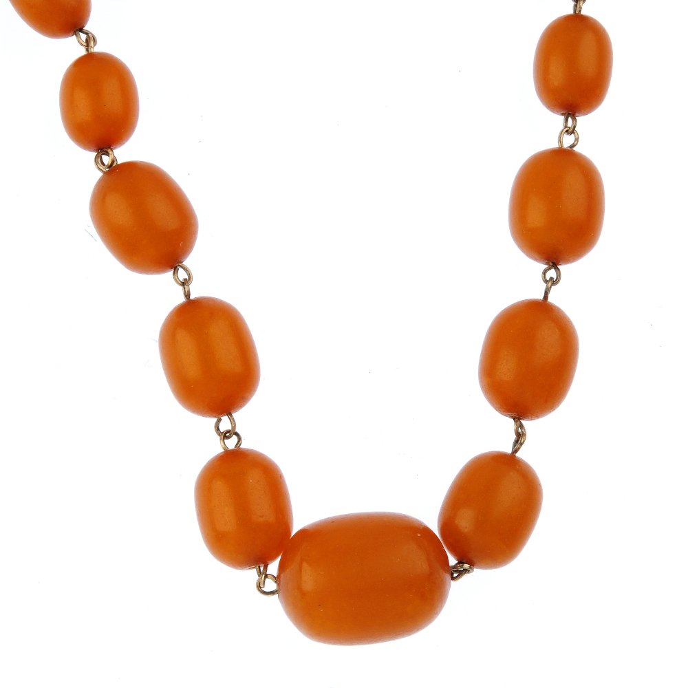 A reconstructed amber bead necklace. Designed as (1 of 2)