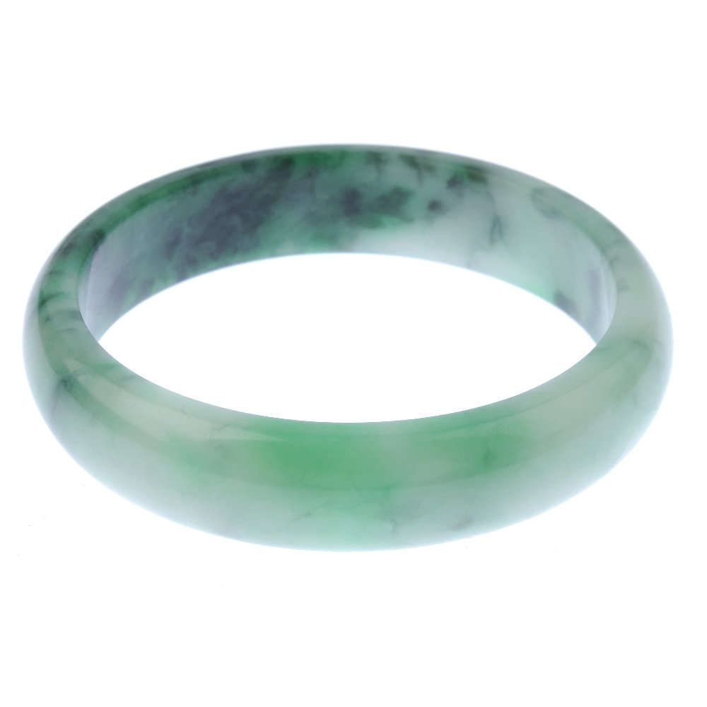 Two gem bangles. To include a plain D-shape jade bangle (1 of 4)