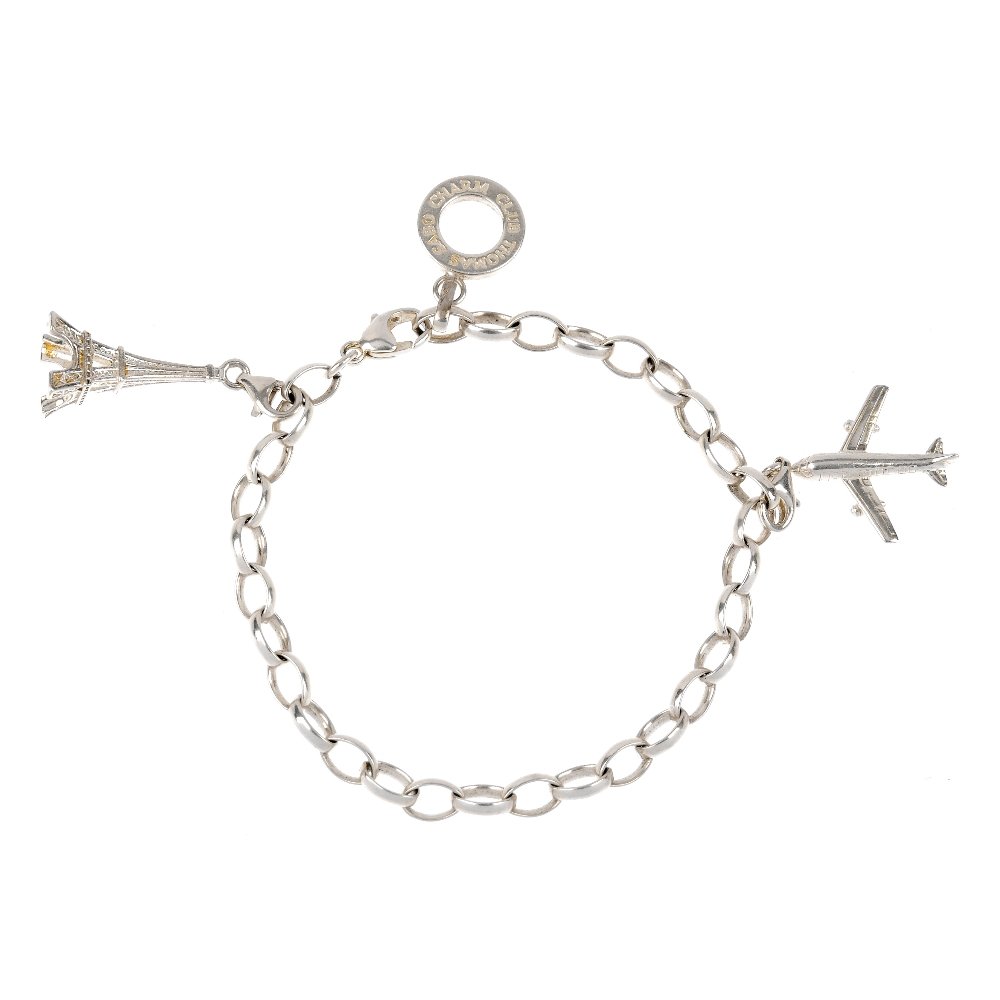 THOMAS SABO - two charms bracelets, a ring and a charm.: THOMAS SABO - two charms bracelets, a ring and a charm. To include two belcher-link bracelets, suspending a total of three charms, a Thomas Sabo paste band ring and a Disney charm. Bracelets, charms a