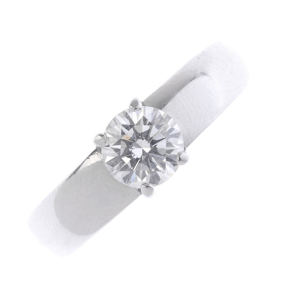 An 18ct gold diamond single-stone ring. The (1 of 3)