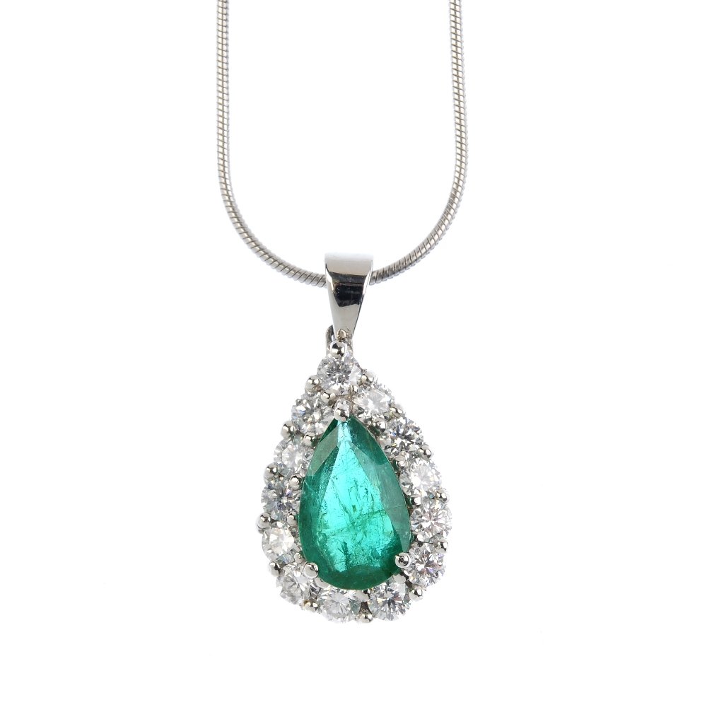 A platinum, emerald and diamond cluster pendant. The (1 of 3)