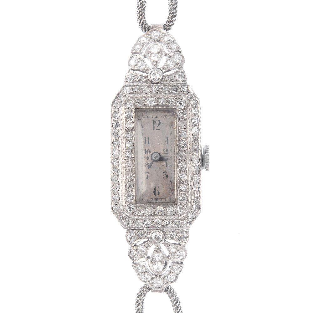 A diamond cocktail watch. The rectangular-shape cream (1 of 3)