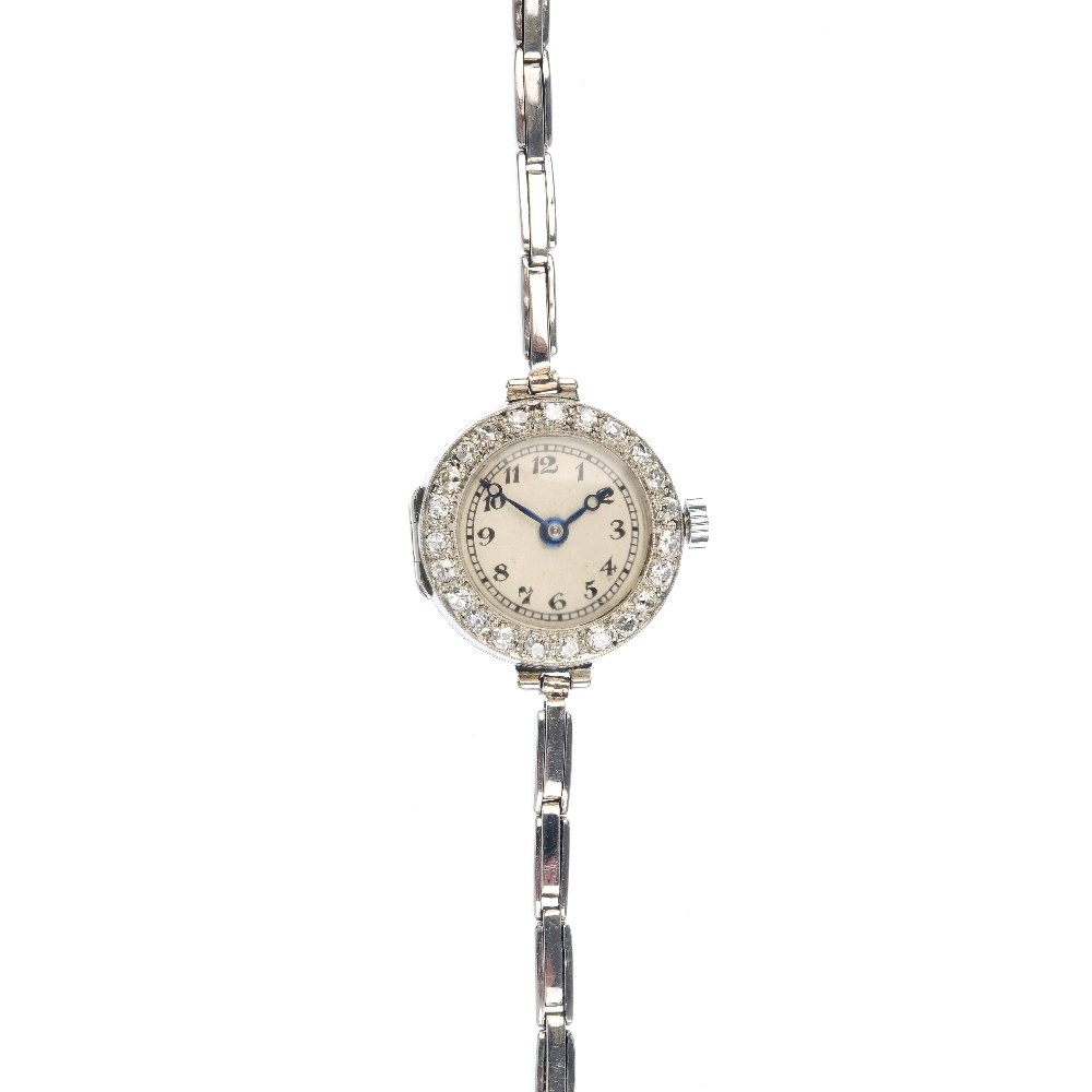 A ladies early 20th century platinum diamond manual (1 of 3)