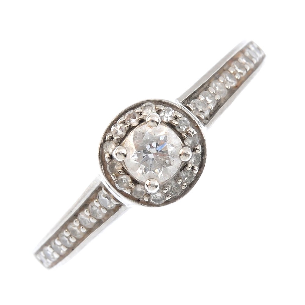A palladium diamond single-stone ring. The (1 of 3)
