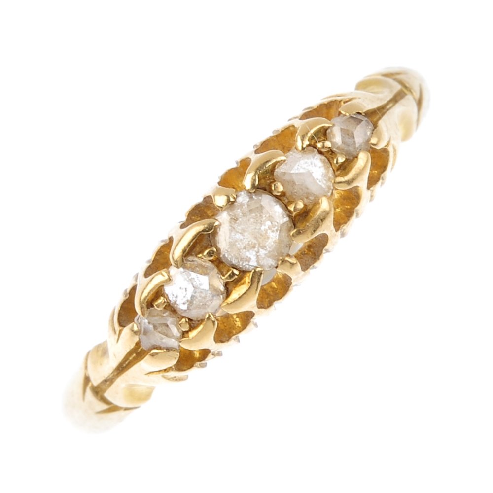 A late Victorian 18ct gold diamond ring. The graduated (1 of 3)