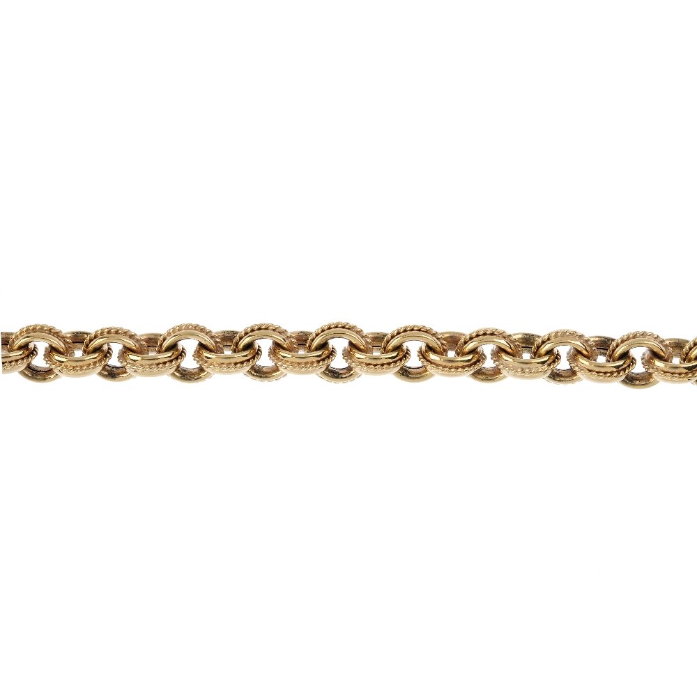 A 9ct gold fancy-link bracelet. Designed as a (1 of 2)
