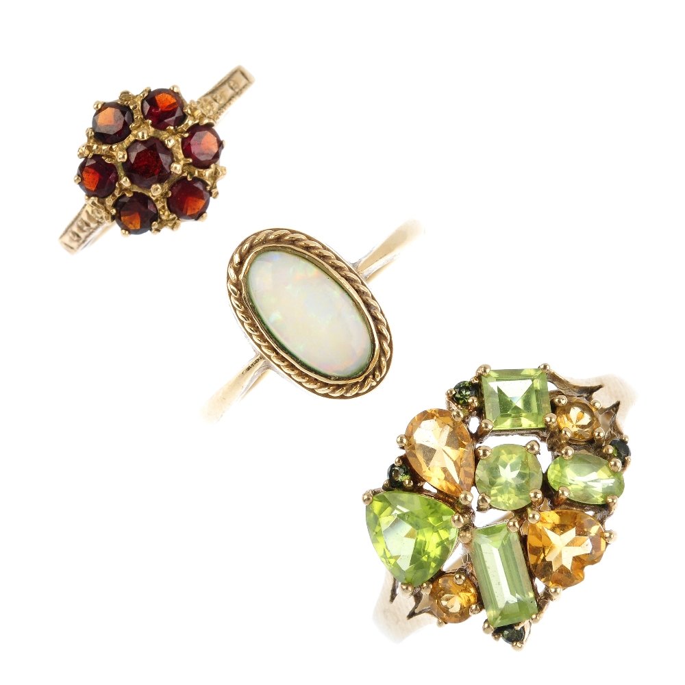 Three 9ct gold gem-set dress rings. To include an opal (1 of 3)