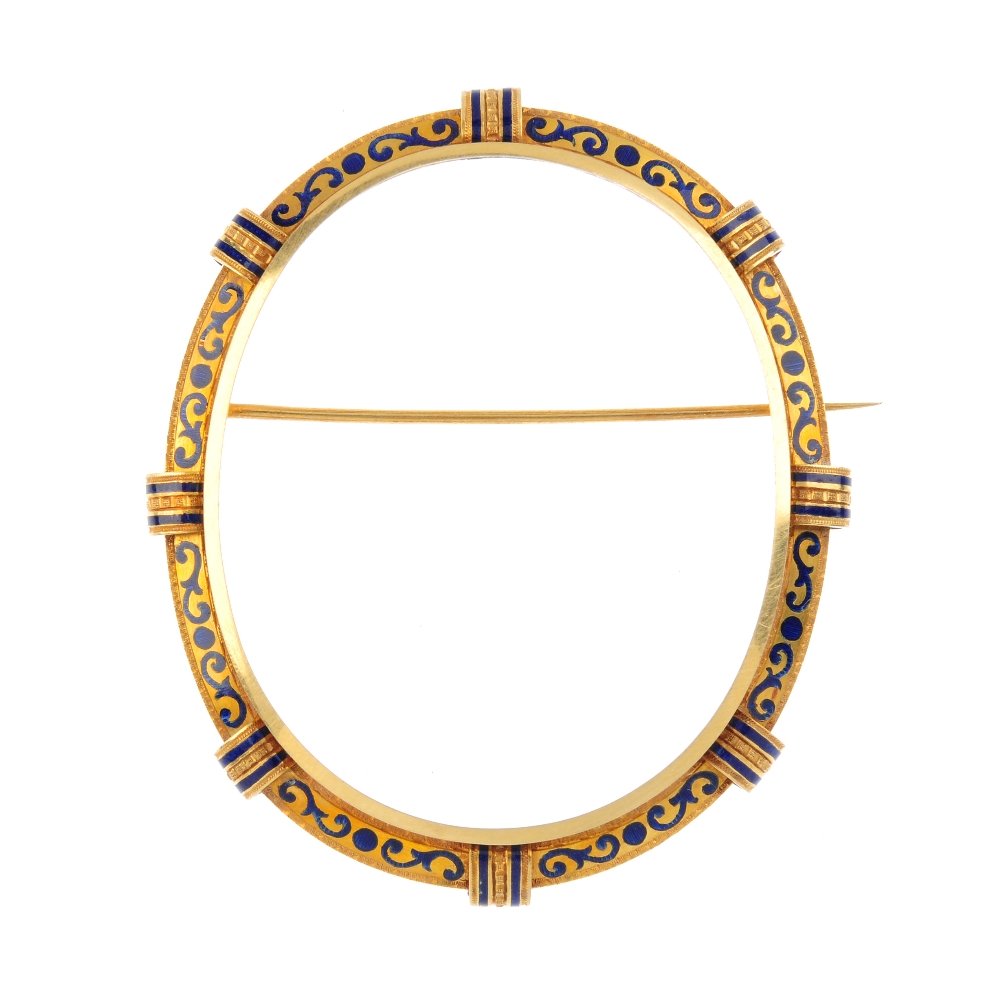 A mid Victorian gold enamel brooch mount. The oval (1 of 2)