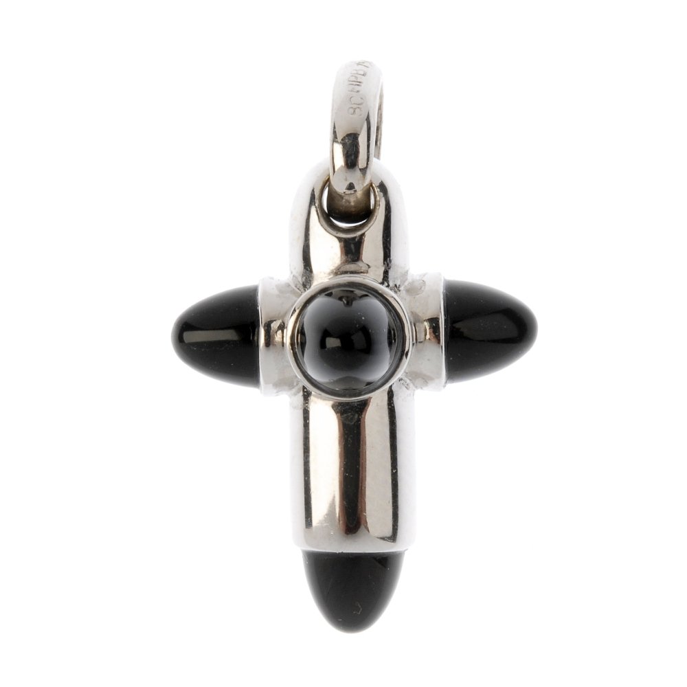 An onyx cross pendant. Designed as a stylised cross, (1 of 2)