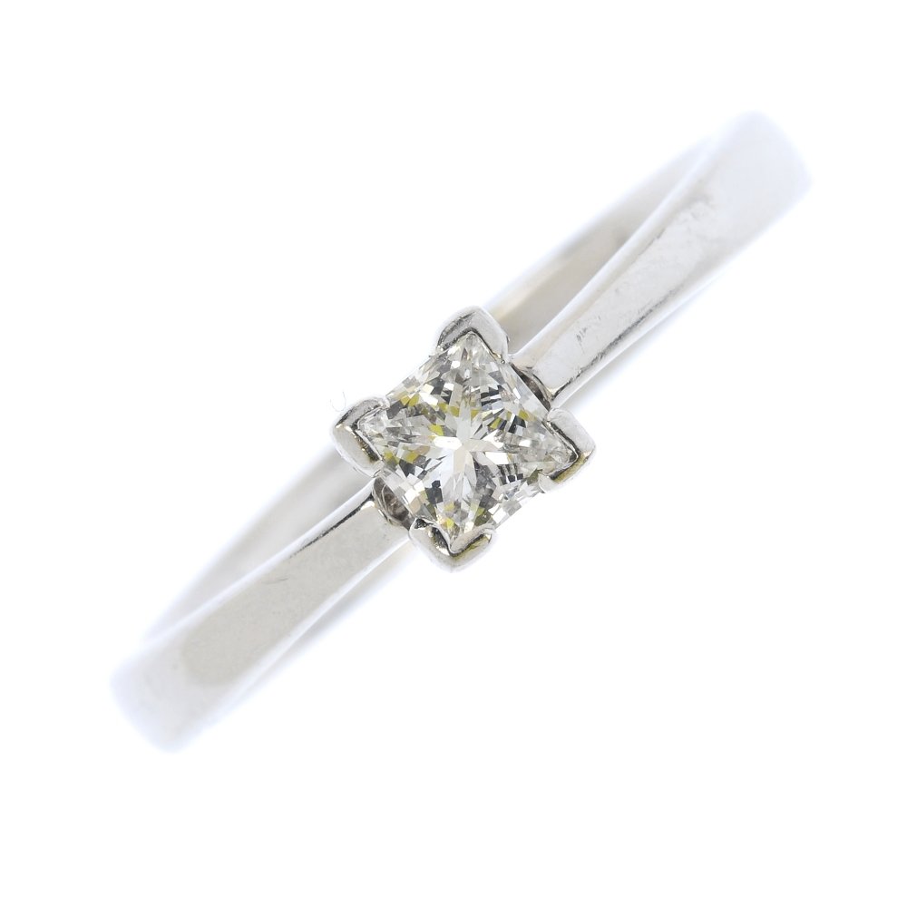 An 18ct gold diamond single-stone ring. The (1 of 3)