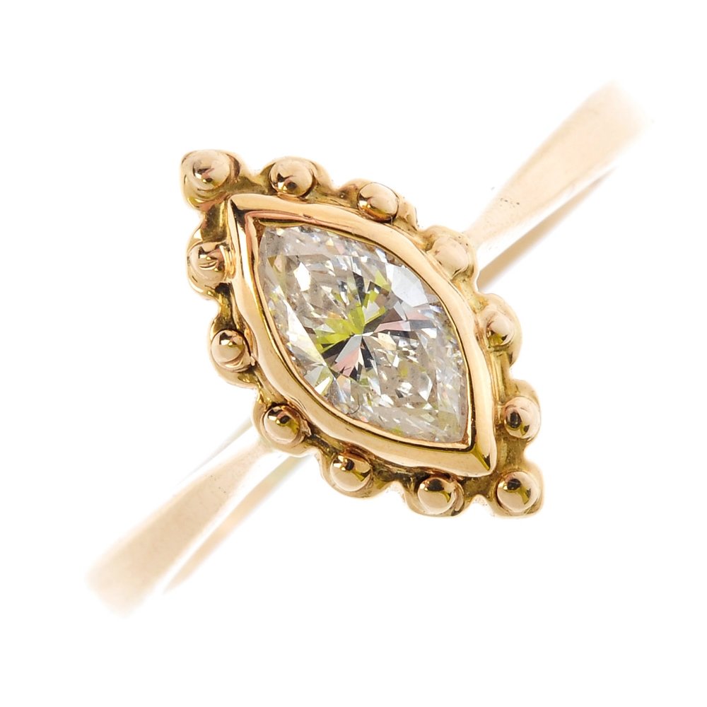 A 9ct gold diamond single-stone ring. The (1 of 3)