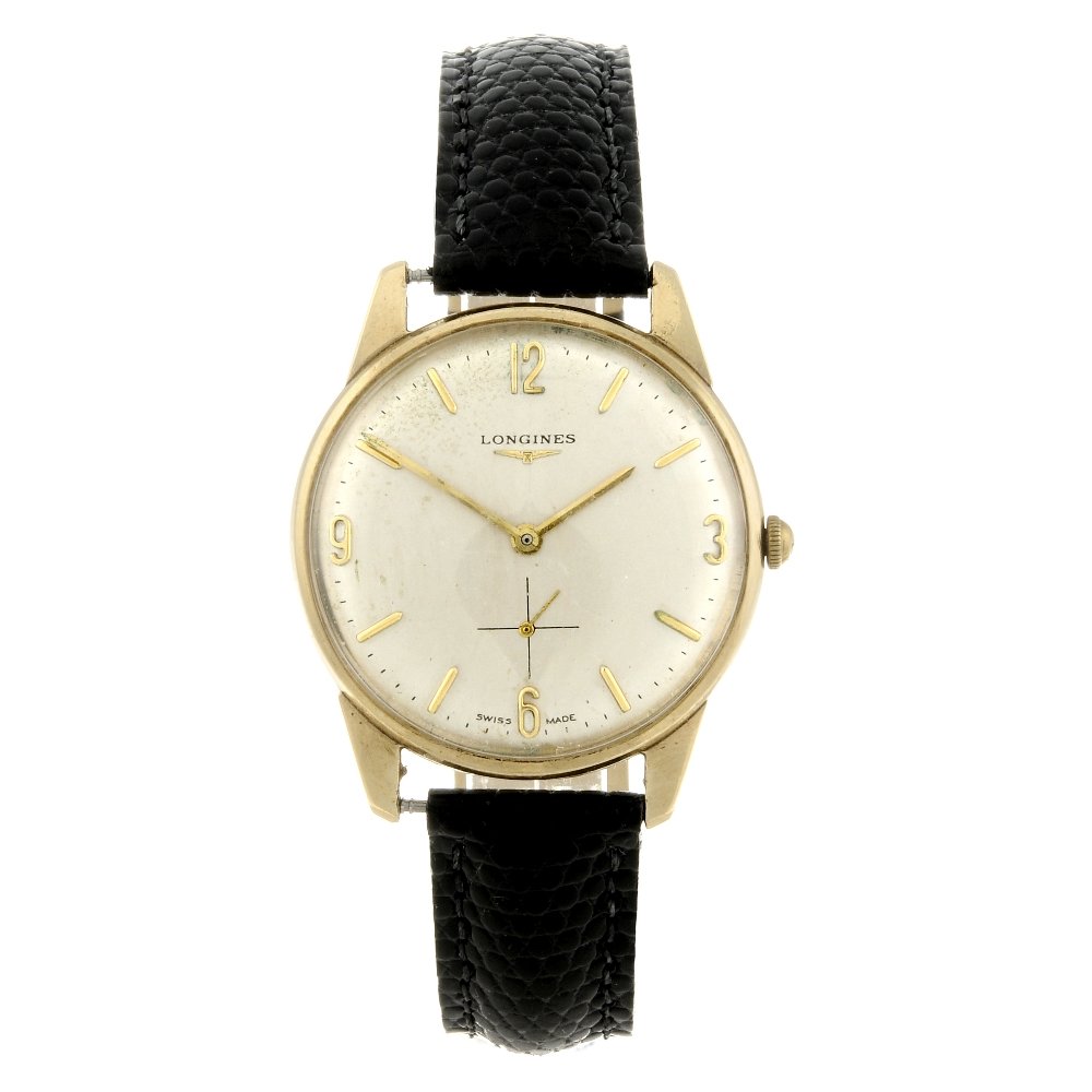 LONGINES - a gentleman's wrist watch. 9ct yellow gold (1 of 4)